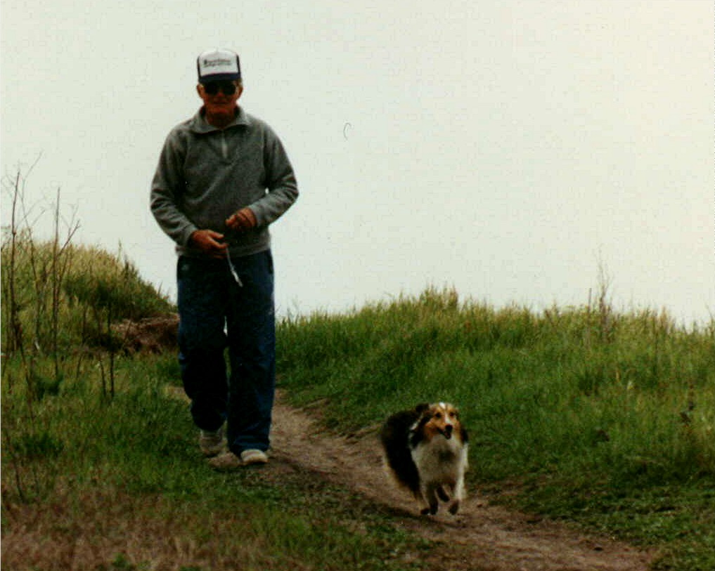 Stella loved to run on the bluffs with Dad.  We called it "prariedoggin"  - We used to yell "prarie dog, Stella!"